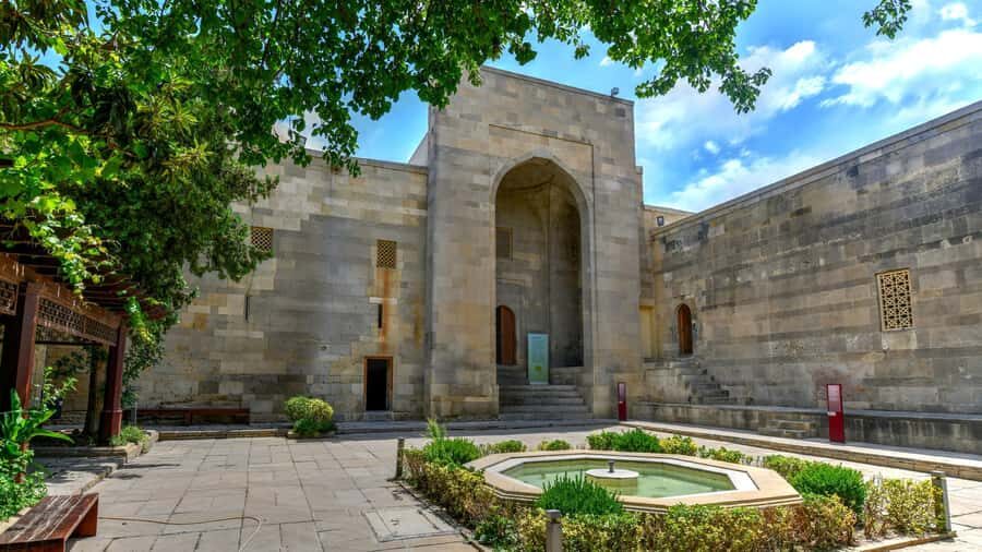 Become a Baku resident in a day - Gobustan rock arts and mud volcanoes: where the ground looks staged