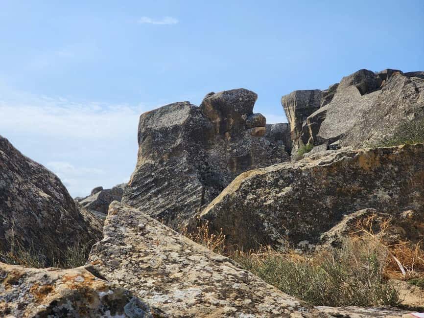 From Baku: Gobustan Rock Art and Mud Volcanoes Tour - Mud Volcanoes in Gobustan: Bubbling Pools and Steam Vents